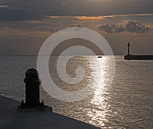 Sunrise over Dock Pier Seawall Jetty of Puerto Sunrise over Juarez in Cancun Bay Mexico