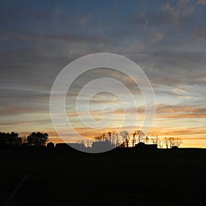 Sunrise over FingerLakes farmstead Cayuga Lake