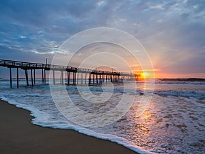 Sunrise over fishing pier at North Carolina Outer Banks