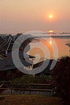 Sunrise over the floating cottages