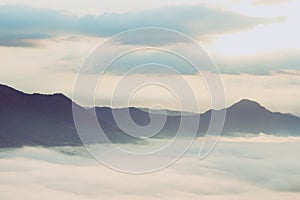 Sunrise over foggy mountain valley, Thailand