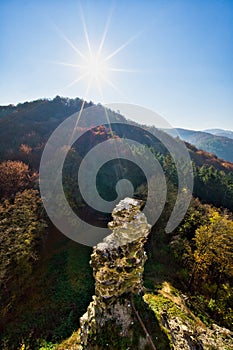 Sunrise over footpath to hrad Sasov castle near river Hron during autumn