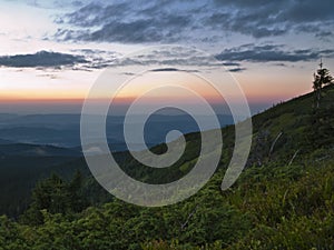 Sunrise over the hillside of mountain.