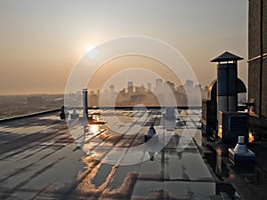 Sunrise Over Hirise Rooftop