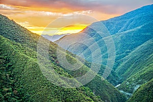 Sunrise over Jungle Covered Hills