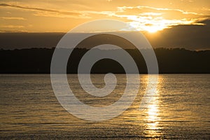 Sunrise over lake Apoyo near Granada, Nicaragua photo