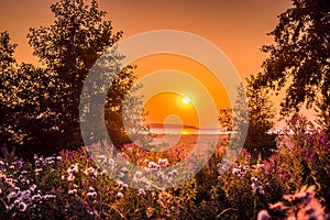 Sunrise over a lake in a countryside