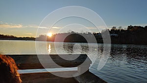 Sunrise Over Lake Dock Reflected