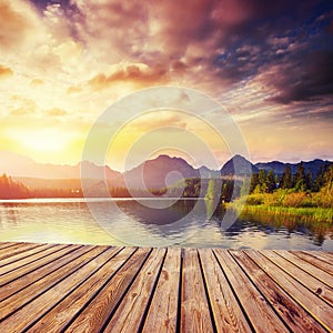 The sunrise over a lake in the park High Tatras