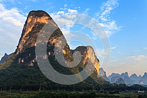 Sunrise over limestone hills