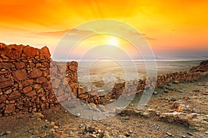 Sunrise over Masada fortress photo