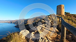 Sunrise over Mediterranean sea. Historic Torre Vigia De Cerro Gordo