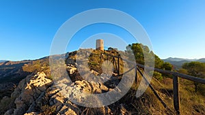 Sunrise over Mediterranean sea. Historic Torre Vigia De Cerro Gordo