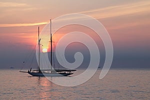 Sunrise over the Mediterranian sea, Antibes, France photo