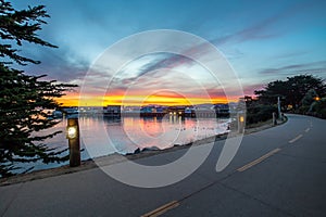 Sunrise over Monterey Bay from Old Fisherman\'s Wharf in Monterey, California