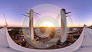 Sunrise Over a Monumental Bridge Construction Site