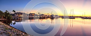 Sunrise over Naples City Dock in Naples, Florida.