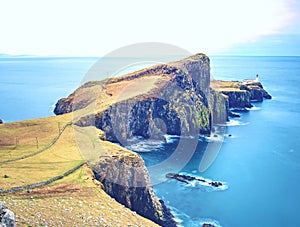 Sunrise over the Neist Point Lighthouse. Popular photographers location