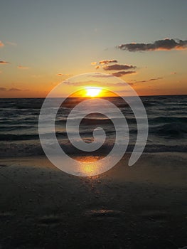 Sunrise over the ocean horizon Cancun Mexico beach sun sky clouds sunlight reflection travel tourism