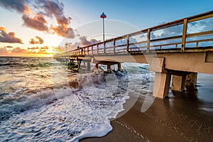 Sunrise over pier in Miami beach, Florida, USA