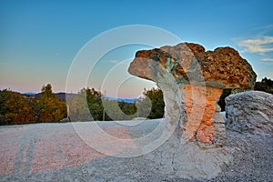 Sunrise over rock formation The Stone Mushrooms near Beli plast village, Bulgaria