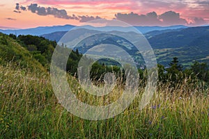 sunrise over rural valley and mountains