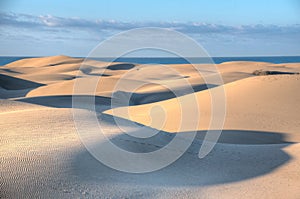 Sunrise over sand dunes at Maspalomas, Gran Canaria, Canary Islands, Spain