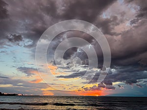 Sunrise over the sea and beautiful cloudscape.