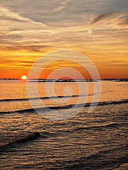 Sunrise over the sea on an empty beach in Montesilvano, Abruzzo