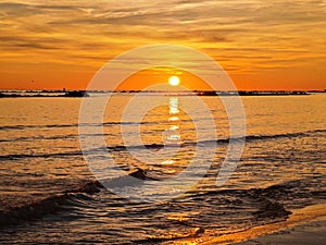 Sunrise over the sea on an empty beach in Montesilvano, Abruzzo