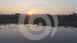 Sunrise Over the Serene Lake