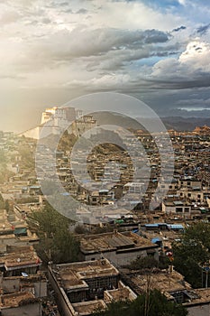 Sunrise over Shigatse with Little Potala on background, residence of Panchen Lama, Tibet - China