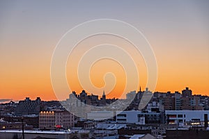 Sunrise over the skyline and skyscraper buildings of Red hook New York