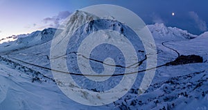 Sunrise over snow-covered Glencoe in Winter