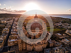 Sunrise over St. John Baptist Church. Gozo, Malta photo