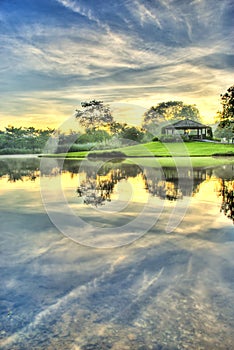 Sunrise Over Still Lake