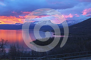 Sunrise over Torne trÃ¤sk and U-shaped mountain named Lapporten