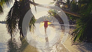 Sunrise over tropical island beach and palm trees. Punta Cana, Dominican Republic