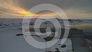 Sunrise over vernadsky arctic station aerial view