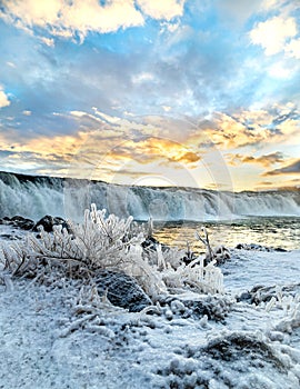 A sunrise over Waterfall Faxi