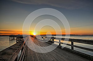 Sunrise over a wooden pier, Sidney, BC
