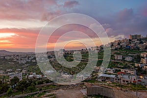 Sunrise in Palestine, a peaceful landscape at dawn. night lights in old historical biblical city Bethlehem