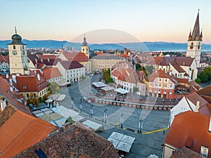 Sunrise panorama of Piata Mica in Sibiu, Romania