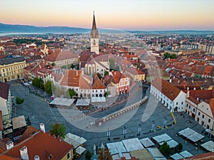 Sunrise panorama of Piata Mica in Sibiu, Romania