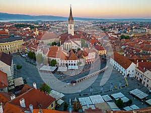 Sunrise panorama of Piata Mica in Sibiu, Romania