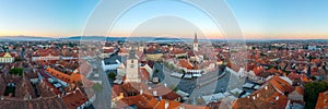 Sunrise panorama of Piata Mica in Sibiu, Romania