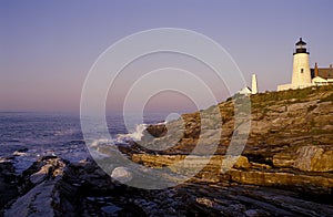 Sunrise By Pemaquid Lighthouse Over Unique Geological Rock Formations in Maine