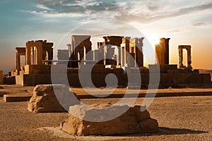 Sunrise in Persepolis, capital of the ancient Achaemenid kingdom. Ancient columns. Sight of Iran. Ancient Persia. photo