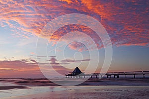 Sunrise at pier in heringsdorf at the baltic sea