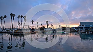 Sunrise pink sky over Channel Islands harbor in Port Hueneme on the gold coast of California United States